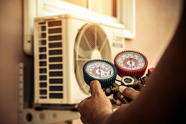 Professional Air Conditioning Service technician working in Kyle, SD
